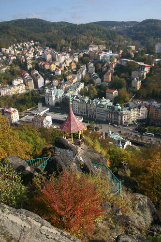 The Jelení Skok/Red Deer’s Jump view point above the spa of Karlovy Vary/Carlsbad. In the valley by the Teplá River, the Hot Spring Colonnade, with the beech forests of the recently declared Karlův hvozd/Charles Deep Forest Nature Reserve in the background. © Přemysl Tájek