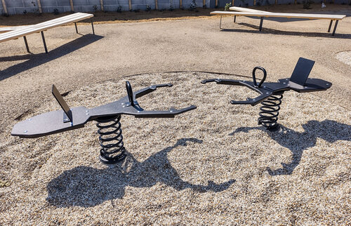 In front of the building, you are welcomed by two fighting males of the stag beetle, mascot of the House of Nature, as a seesaw for small children. © Petra Kotásková