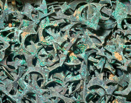 Odstřižky měděného plechu z Mincovny na Zlatém koni, zbytky po výrobě falešných mincí. Odstřižky měděného plechu z Mincovny na Zlatém koni, zbytky po výrobě falešných mincí.